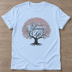 Light Blue Blossom Strong T-shirt — floral strength design, for women who train