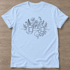 Light Blue Strength Blooms T-shirt — floral strength design, for women who train