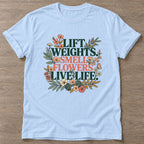 Light Blue Flower Gains T-shirt — floral strength design, for women who train