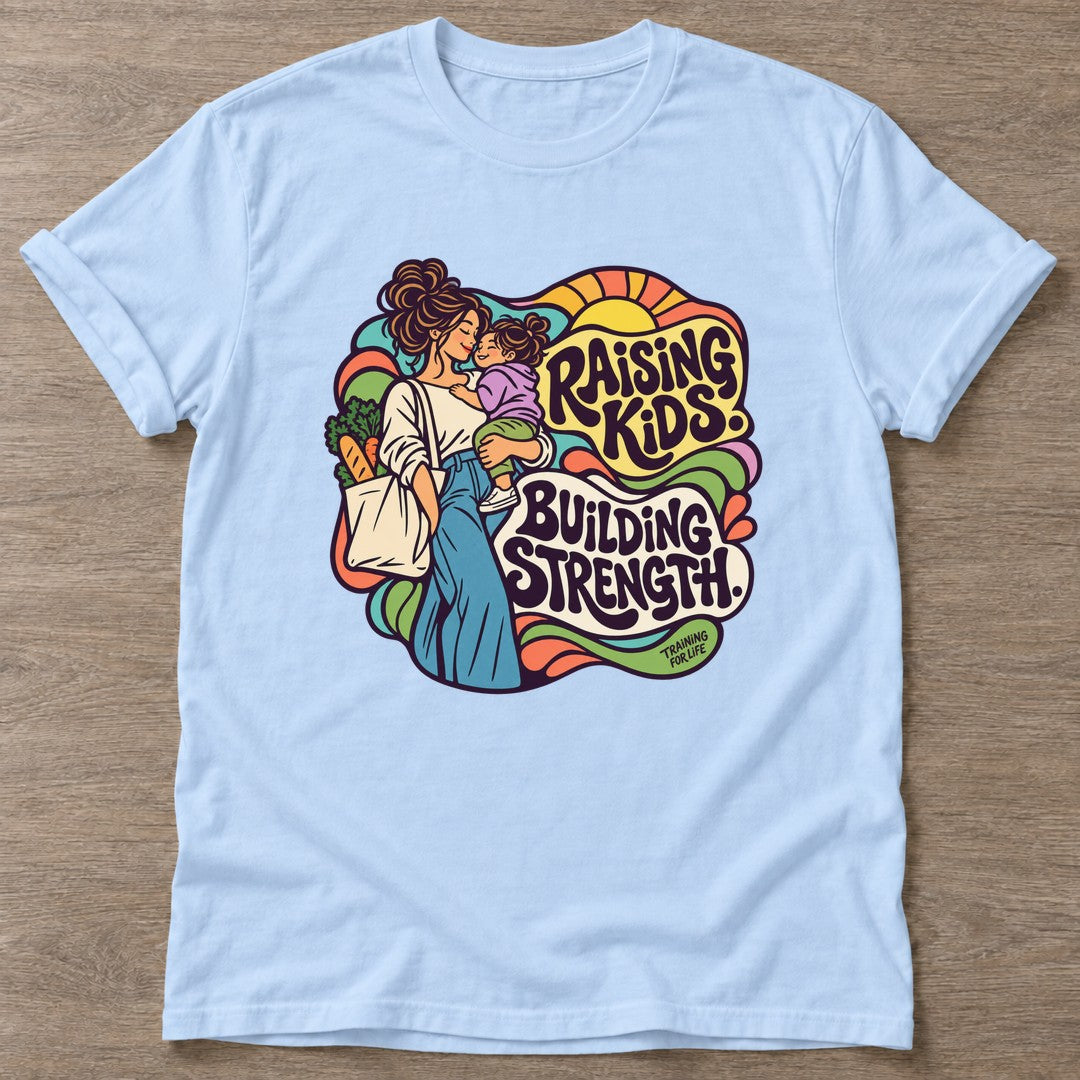 Light Blue Strength Through Motherhood T-shirt — motivational slogan design, for women who train