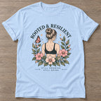 Light Blue Bloom Unshaken T-shirt — floral strength design, for women who train