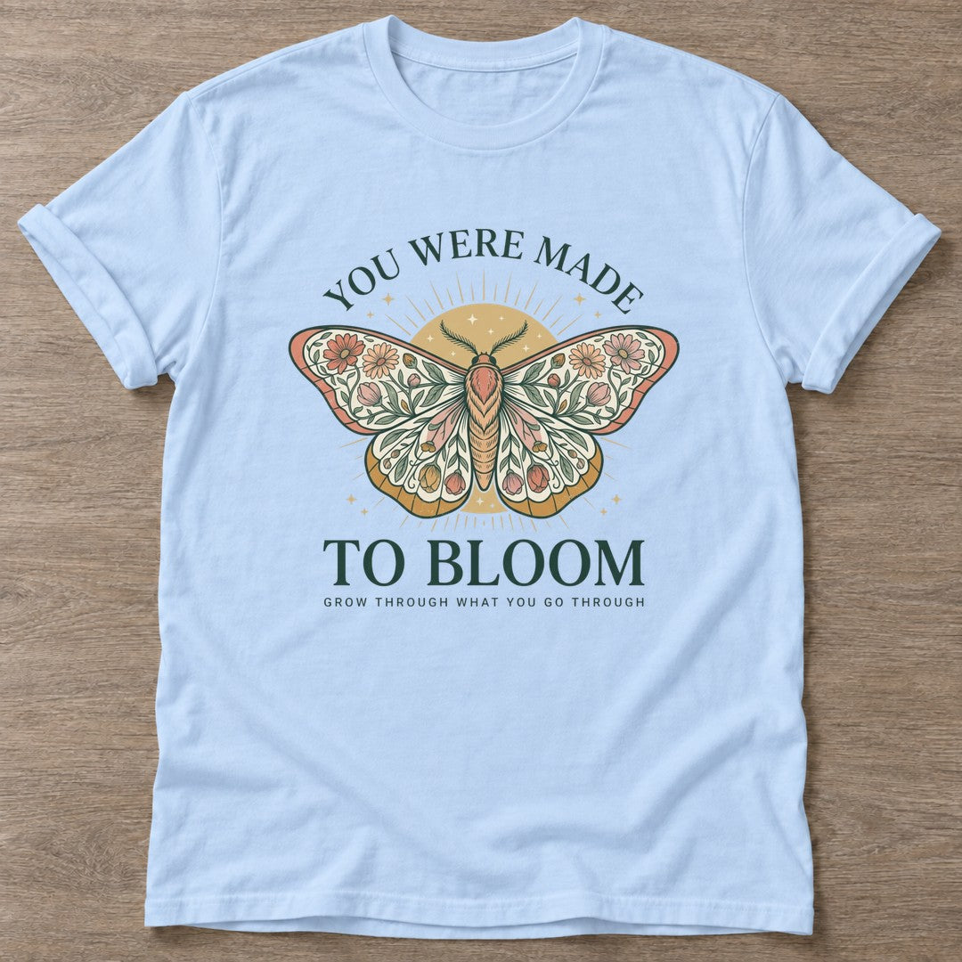 Light Blue Bloom Through T-shirt — floral strength design, for women who train