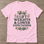 Light Pink Lift And Lower T-shirt — weightlifting design, for women who lift