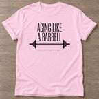 Light Pink Barbell Aging T-shirt — longevity training design, for women over 40