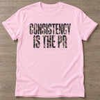Light Pink Consistency Wins T-shirt — motivational slogan design, for women who train