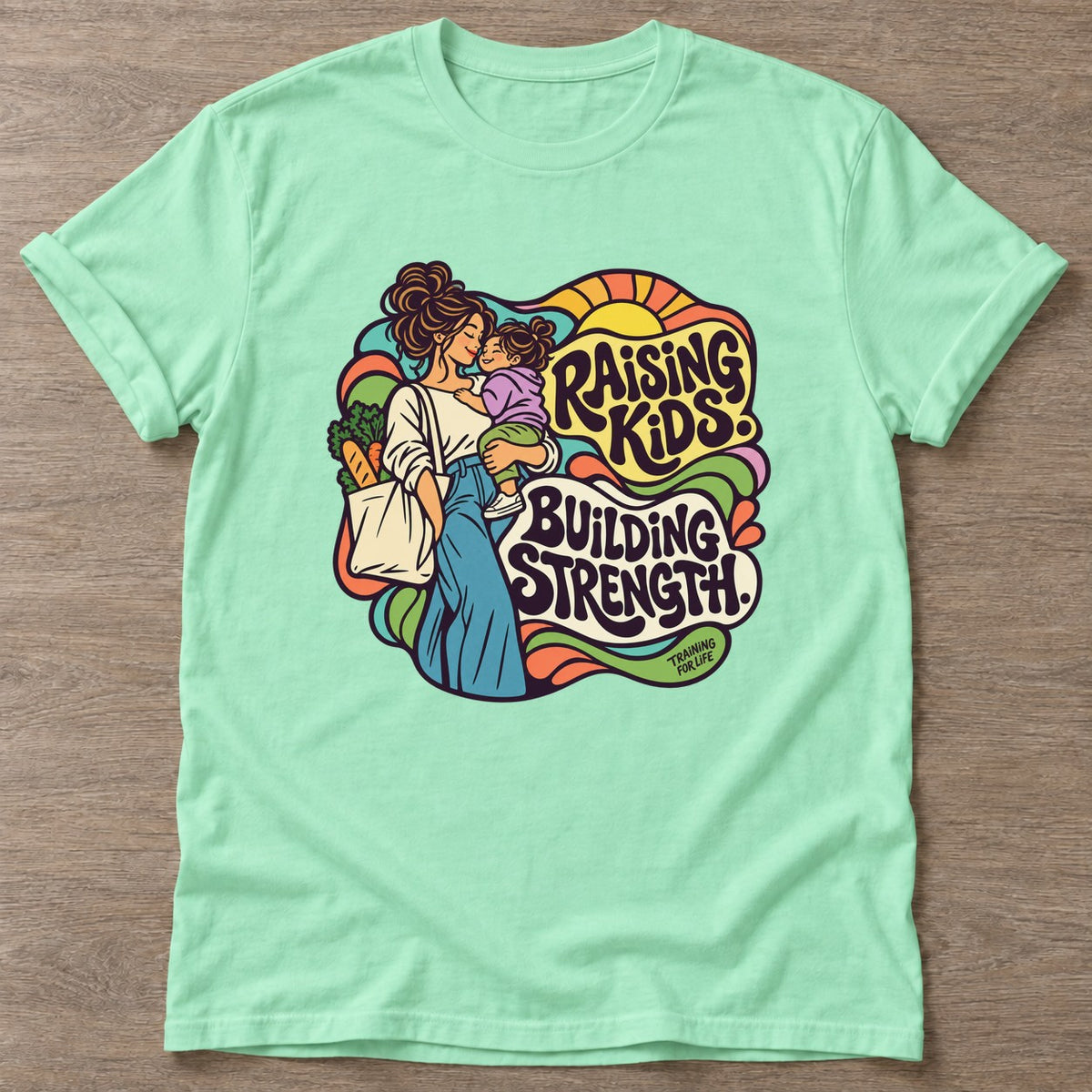 Mint Green Strength Through Motherhood T-shirt — motivational slogan design, for women who train