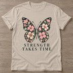 Sand Bloom Patience T-shirt — floral strength design, for women who train