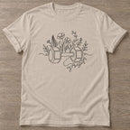 Sand Strength Blooms T-shirt — floral strength design, for women who train