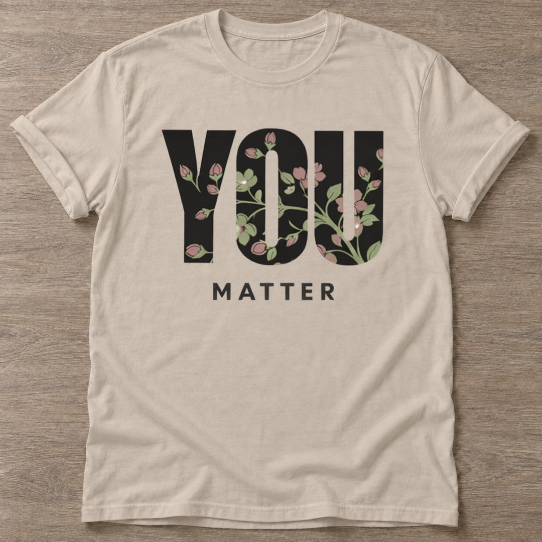 Sand Bloom Matters T-shirt — floral strength design, for women who train