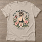 Sand Bloom Unshaken T-shirt — floral strength design, for women who train
