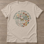 Sand Bloom Resilient T-shirt — floral strength design, for women who train