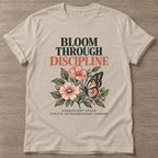 Sand Bloom Daily T-shirt — floral strength design, for women who train